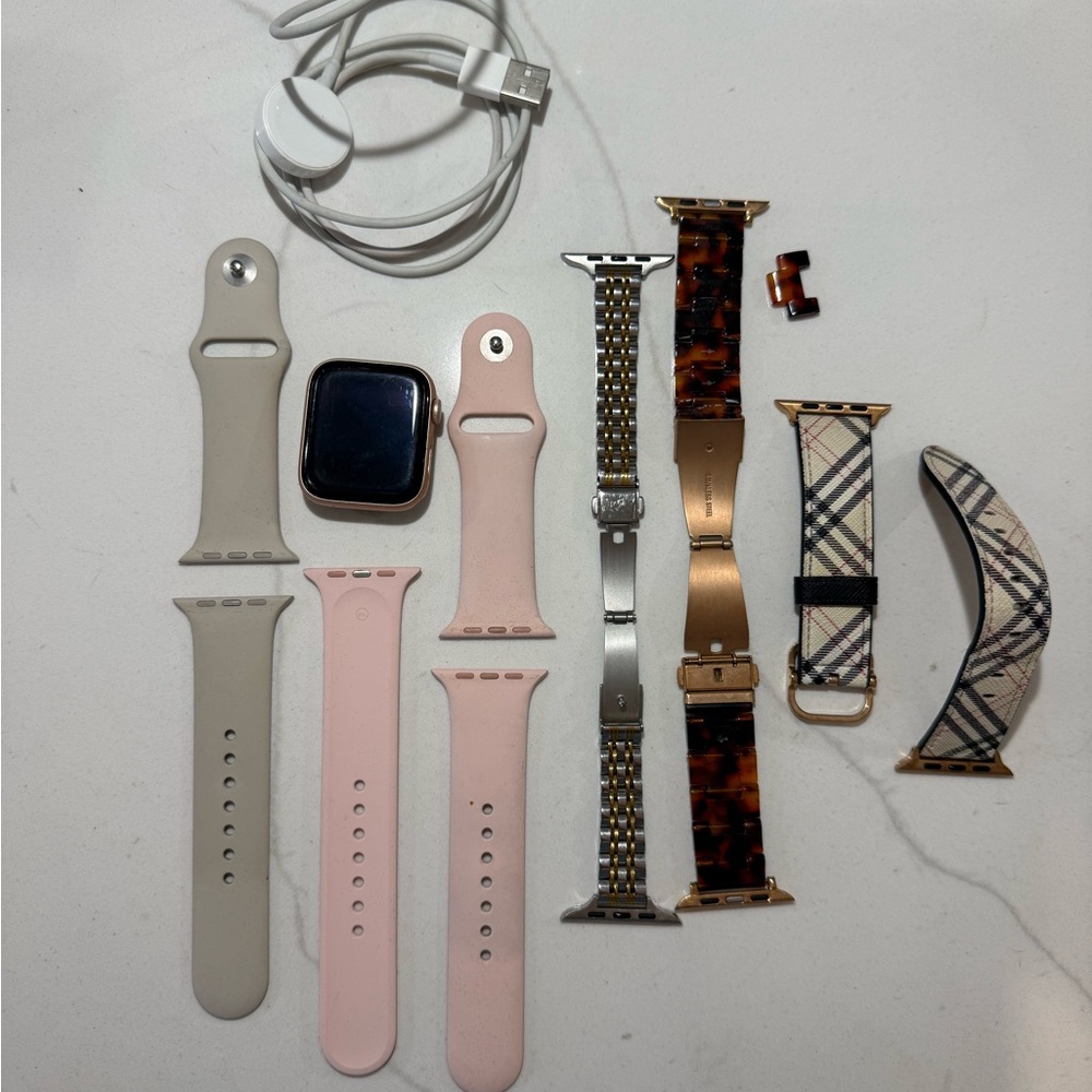 Apple Watch with Multiple Bands. Series 6 - 44mm in Rose Gold